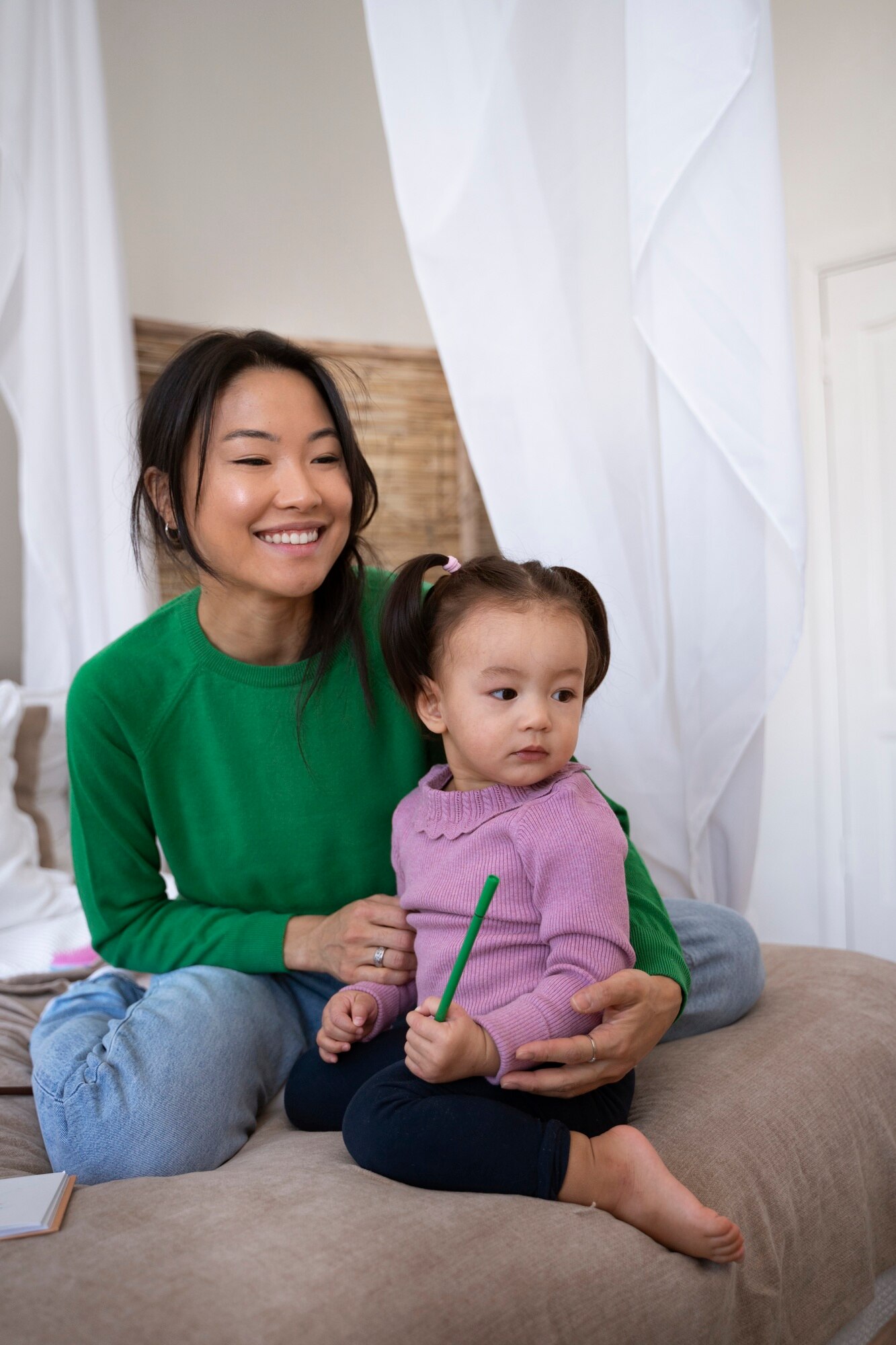 6834de6fb2b2f_asian mother daughter spending time together home_23 2150259917